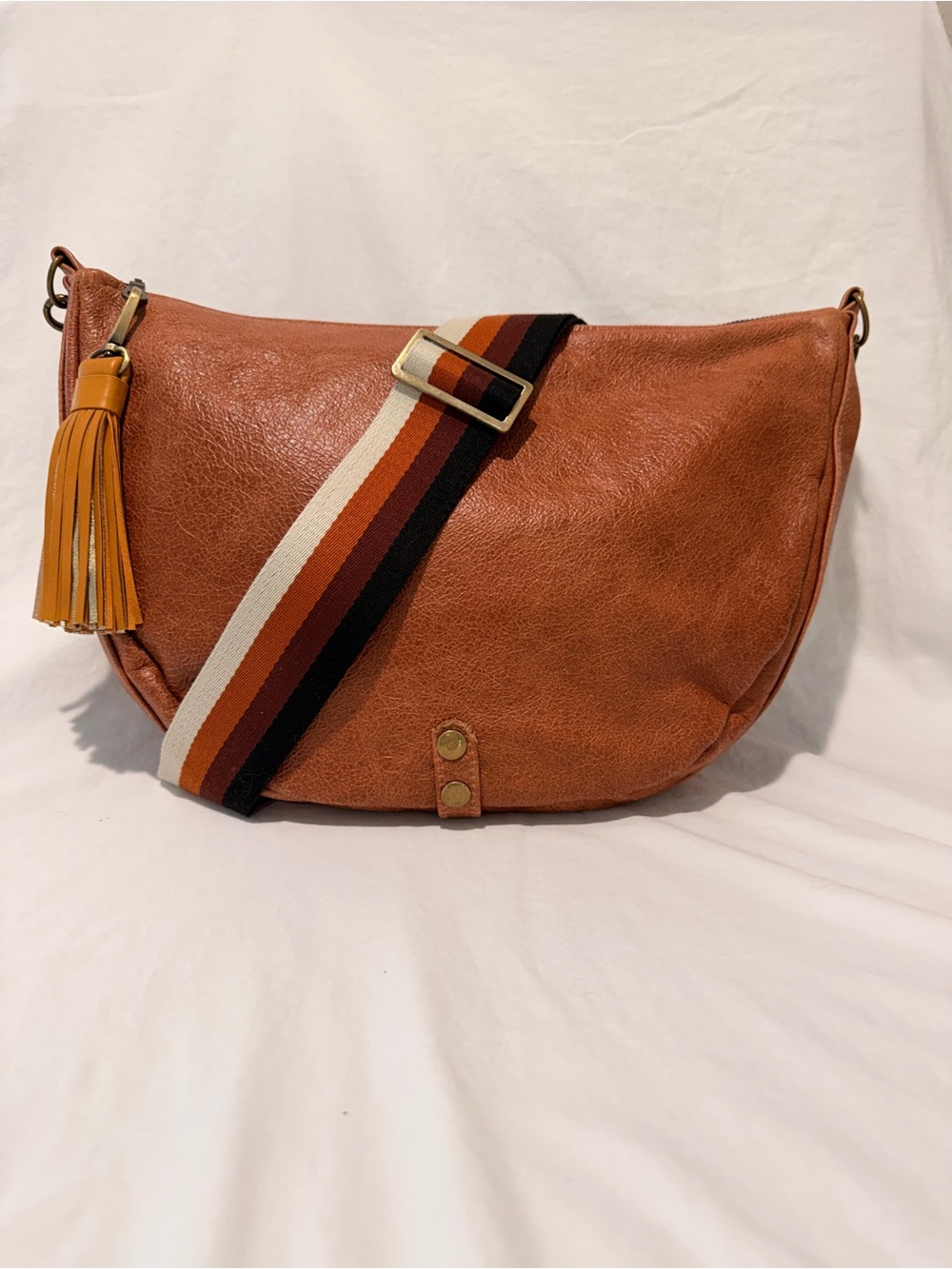 Classic Cognac Crossbody with Striped Adjustable Strap and Tassel